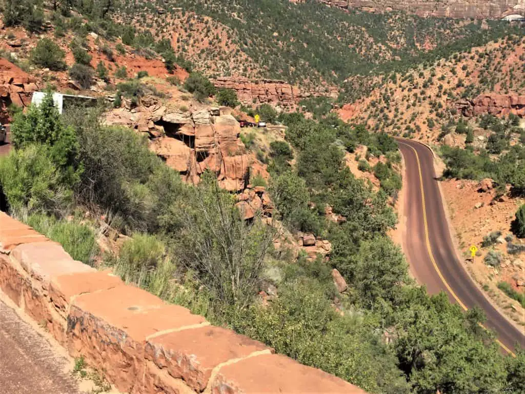 highway switchback with red rocks