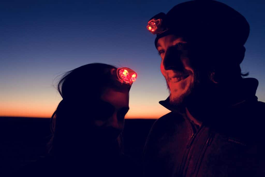 Man and woman hiker wearing a Redlight Headlamp for Stargazing