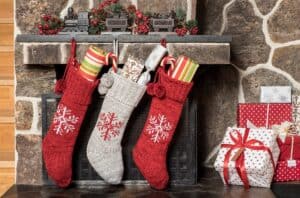 Stocking Stuffers for hikers hanging on fireplace