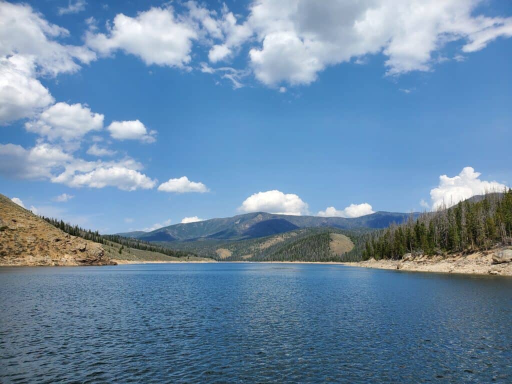 View of Lake Granby with Rocky Mountains in the distance