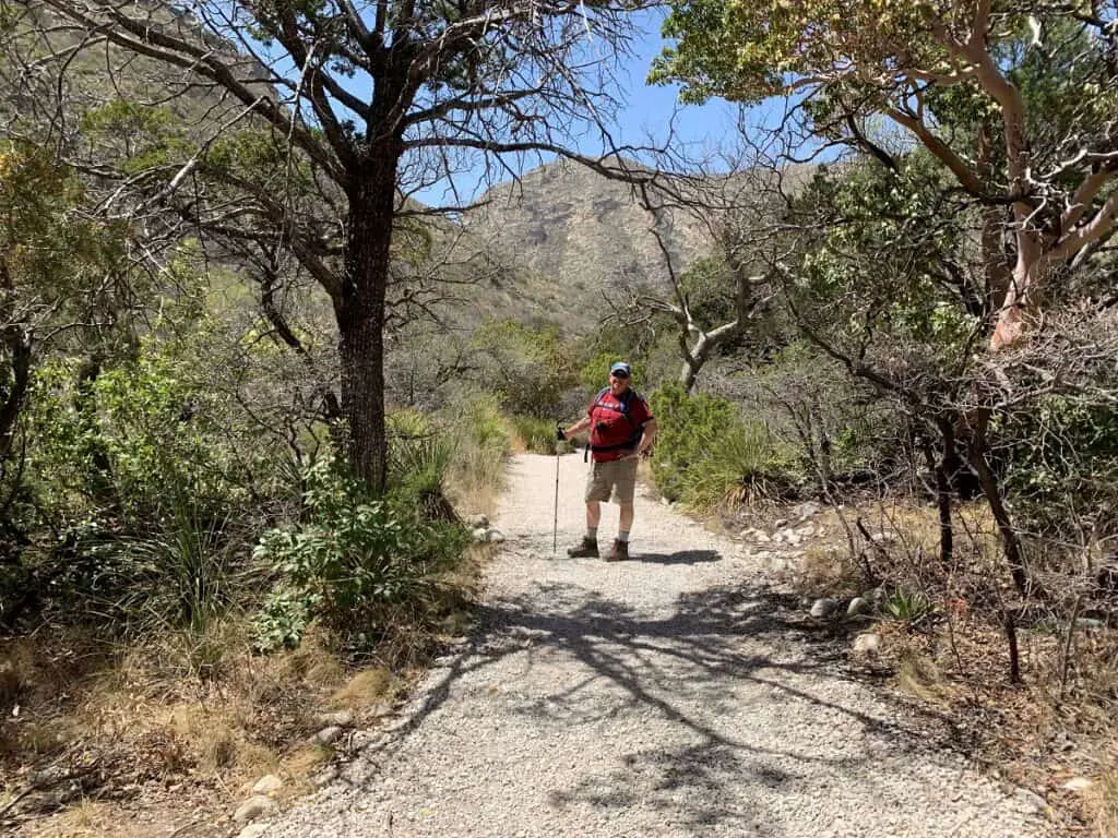 Man on desert hiking trail