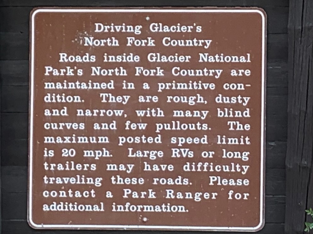 brown national park sign explaining primitive condition of roads in North Fork