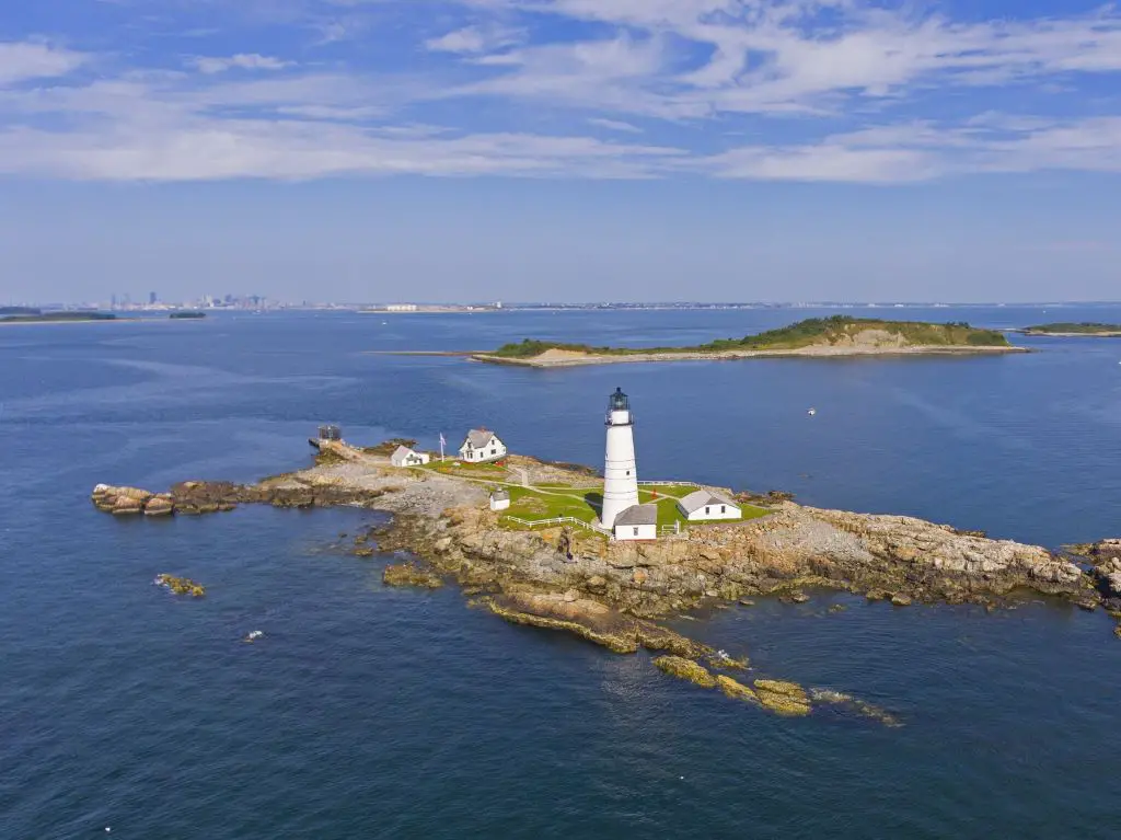 Lighthouse on rocky island in boston harbor