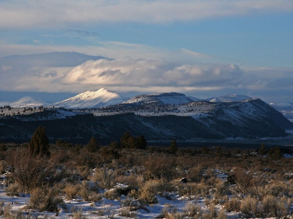 Clouds setting over mountains, view for Lave Beds National Monument a California National Park