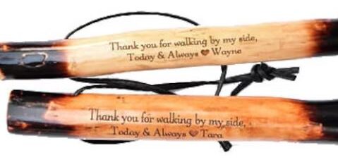 hiking sticks personalized with quotes on white background