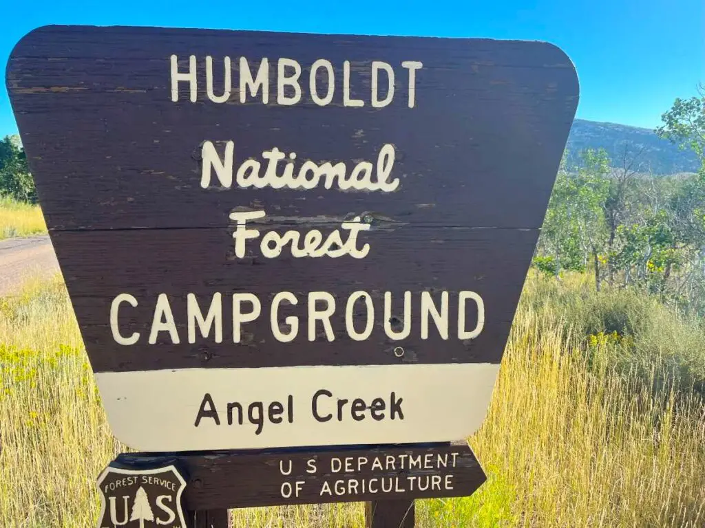 Brown sign that says Humboldt National Forest Campground, a perfect place for walk up camping