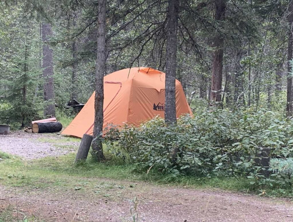 orange tent along gravel road