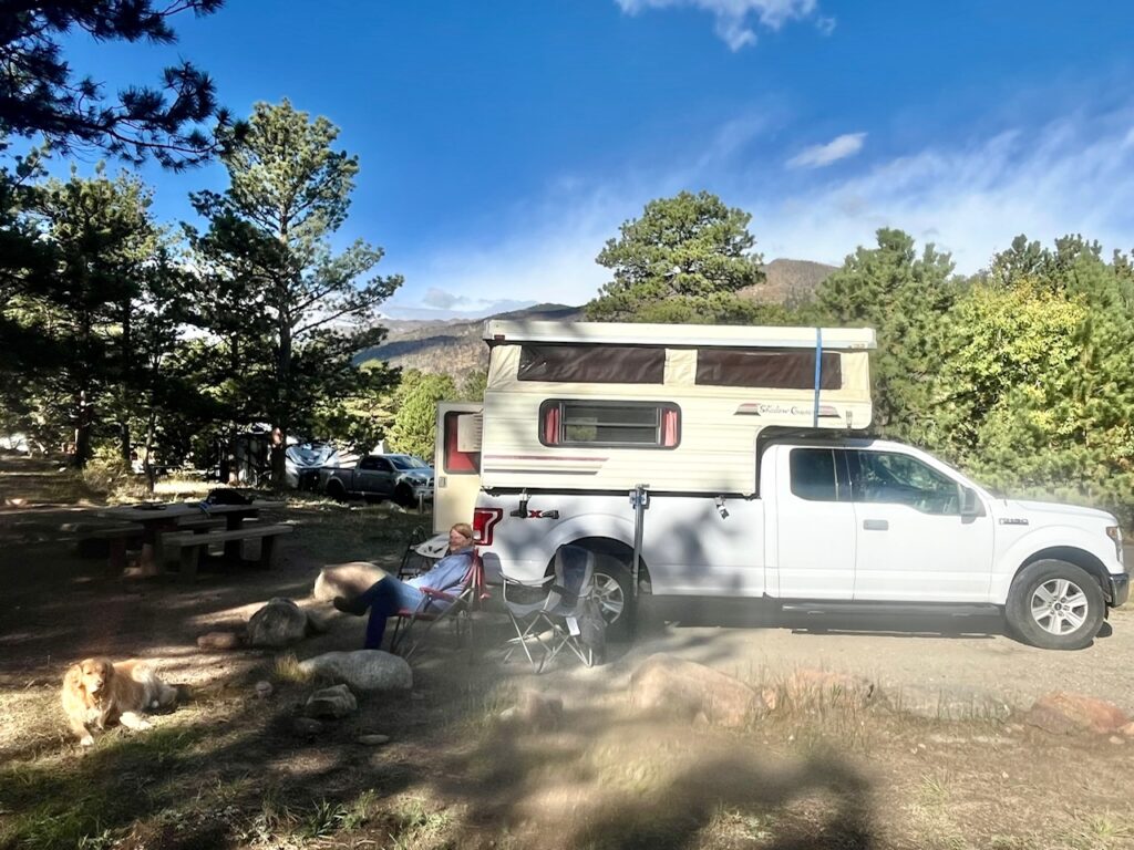 camper truck white with mountains in background