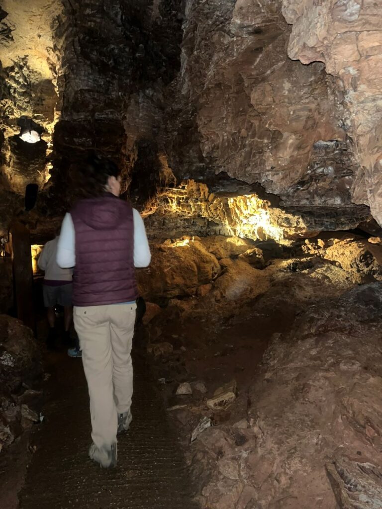 Man walking through Wind Cave